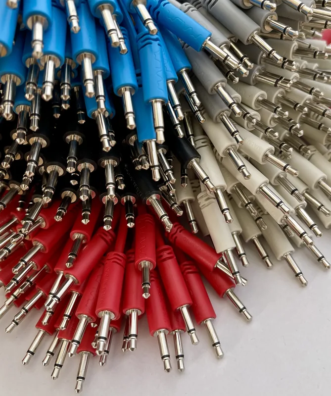 A bundle of red, white and blue patch cables